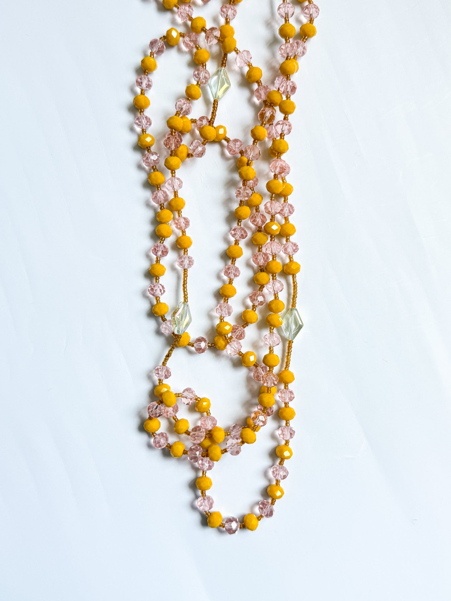 CHAÎNE DE TAILLE JAUNE & ROSE
