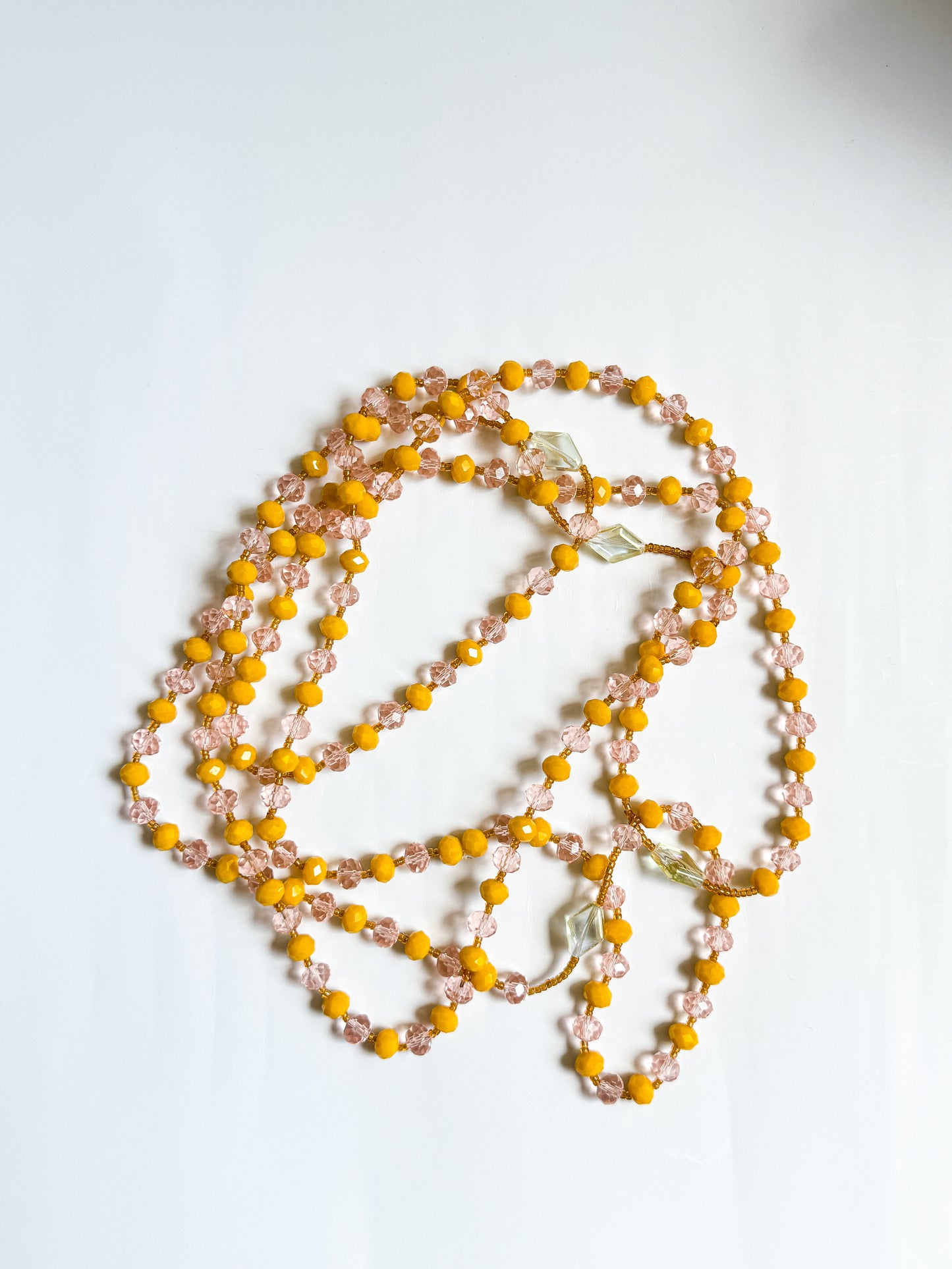 CHAÎNE DE TAILLE JAUNE & ROSE